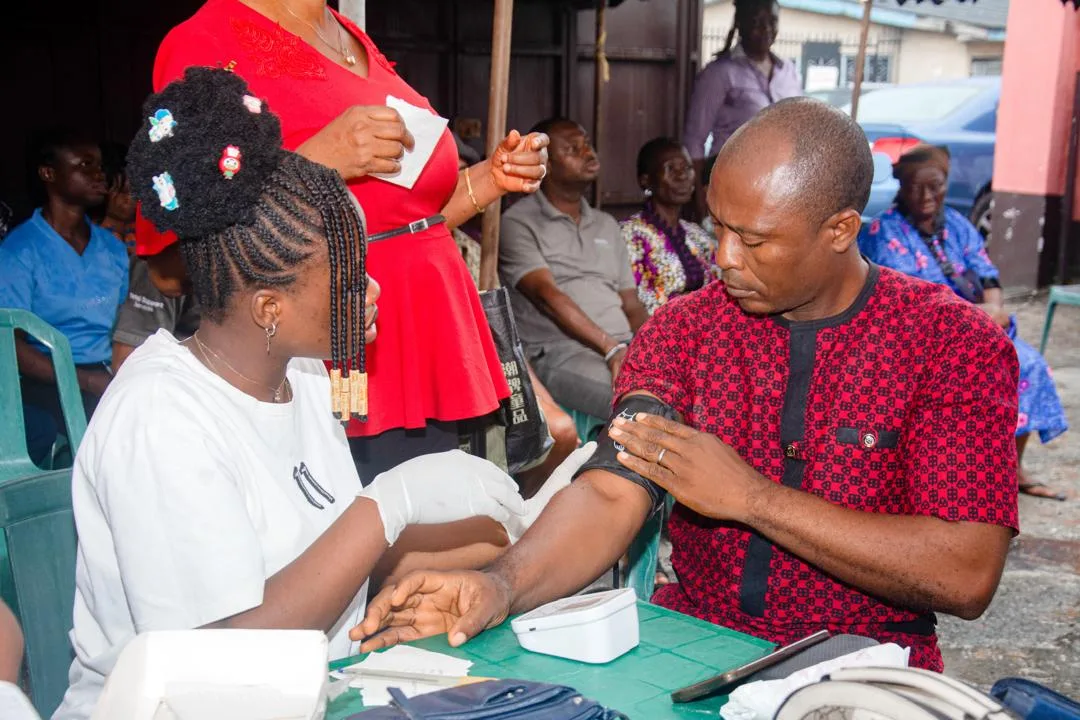 Participant getting his vitals checked  