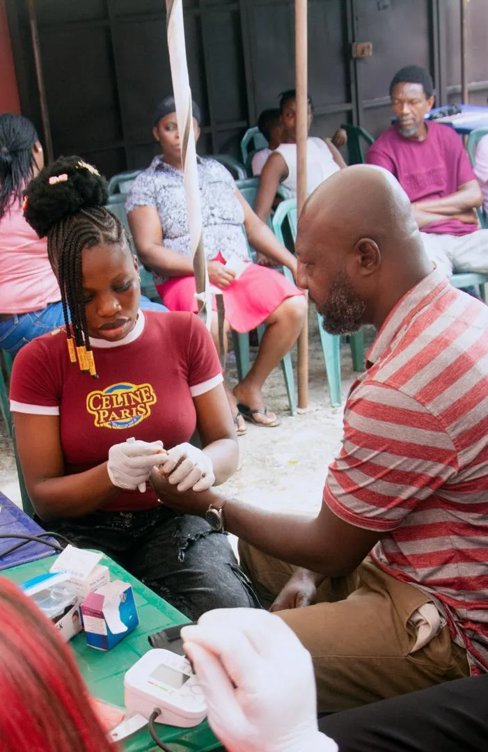 Participant getting his vitals checked  